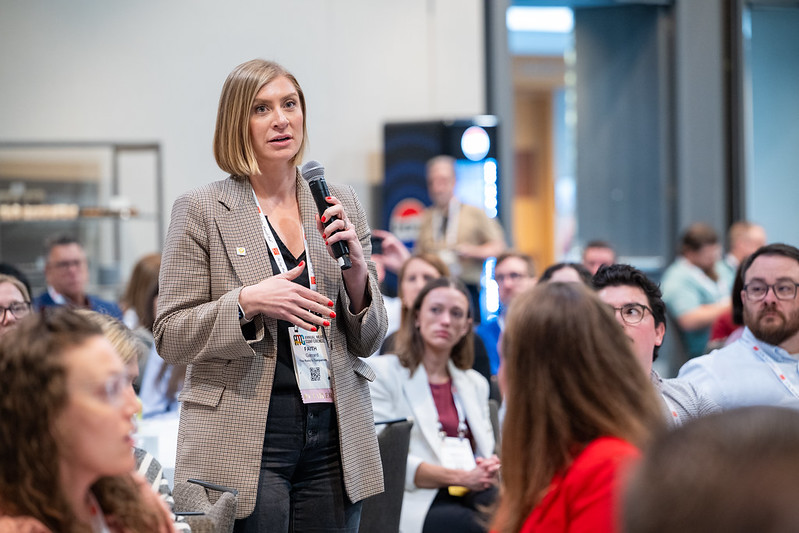 Woman asking question at Annual Meat Conference